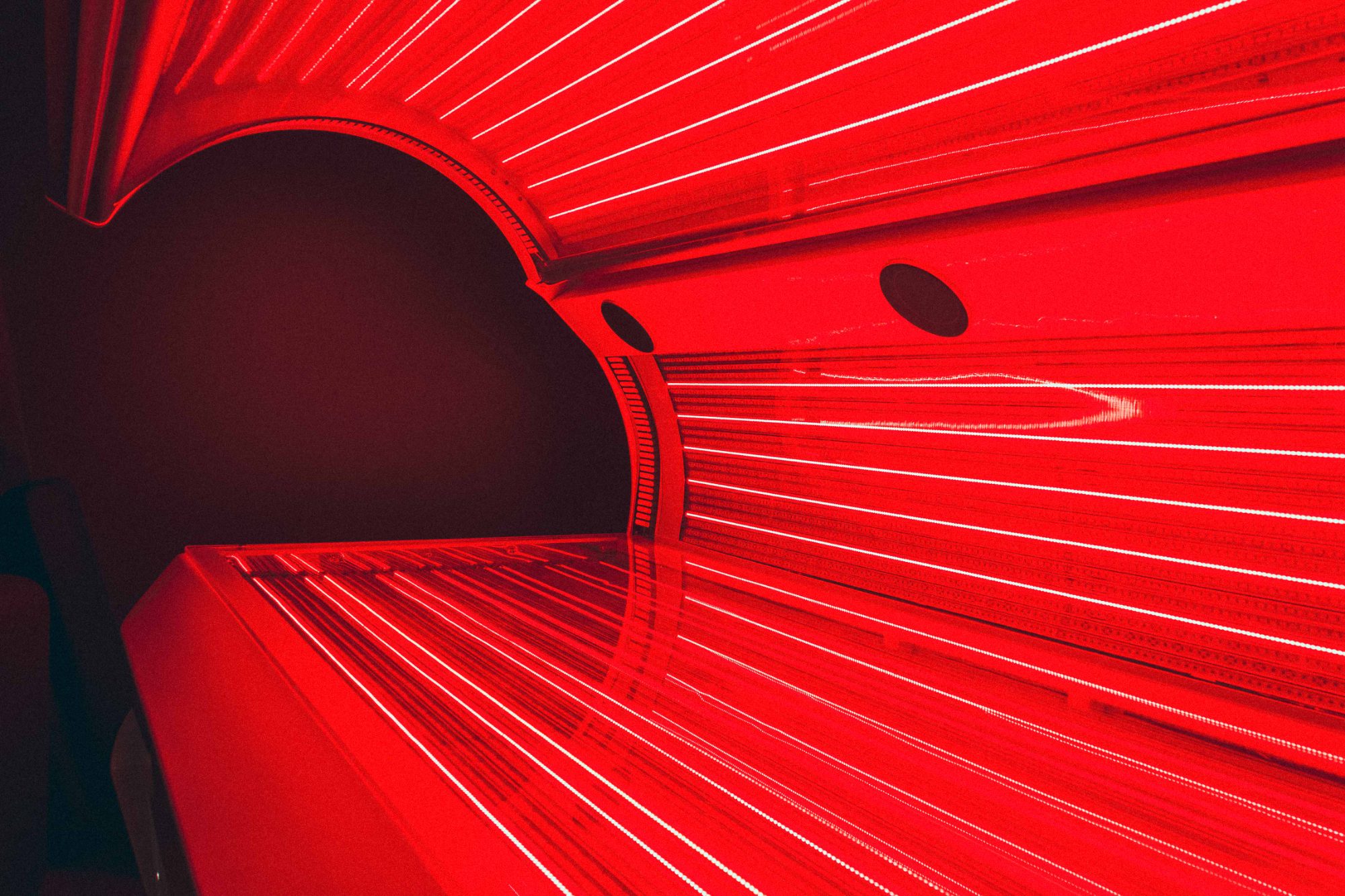 Inside the TheraLight 360 red light therapy bed at Mindbody Lounge, Victoria Park